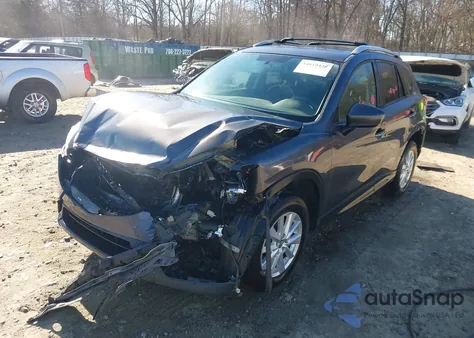 2014 Mazda Cx-5 Touring z USA, uszkodzony, nr VIN JM3KE2CY7E0353194